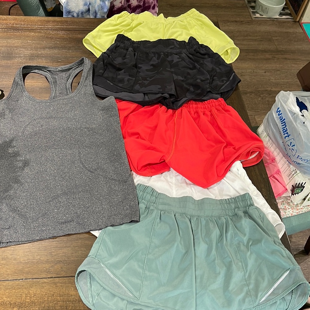 Lot of Lululemon Running Shorts and 1 tank